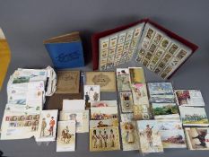 Lot to include postcards, cigarette cards, first day covers and similar.