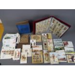 Lot to include postcards, cigarette cards, first day covers and similar.