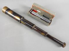 A three draw telescope bearing plaque marked 'Ottway & Co, Ealing London 1915', approximately 38.