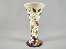 Moorcroft - A Moorcroft Pottery vase in the 'Bramble Revisited' pattern,