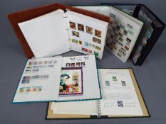 Philately - a collection of postage stamps contained in three stock books, Belgium, Hungary, Malta,