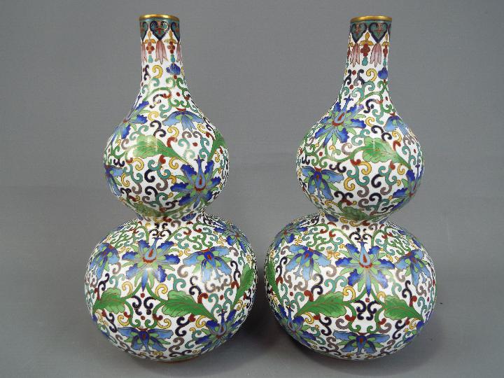 A pair of Chinese double gourd cloisonné vases decorated throughout with stylised lotus scrolls - Image 2 of 4