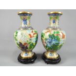 A pair of Chinese cloisonné vases, the body decorated with chrysanthemum,