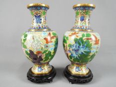 A pair of Chinese cloisonné vases, the body decorated with chrysanthemum,