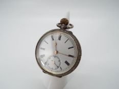 A lady’s silver cased pocket watch, case having engraved decoration,