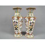 A pair of Chinese Zi Jin Cheng cloisonné hexagonal section vases,