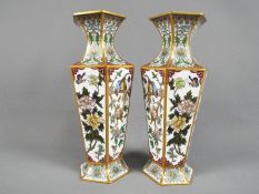 A pair of Chinese Zi Jin Cheng cloisonné hexagonal section vases,