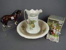 A boxed Yardley English Lavender soapdish, a ceramic model of a horse and a wash jug and bowl.