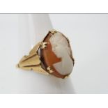 A lady's oval cameo ring, stamped 9ct, size N 1/2, 2.7 grams all in.