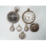 A good mixed lot to include two gentleman’s pocket watches together with four silver watch fobs and
