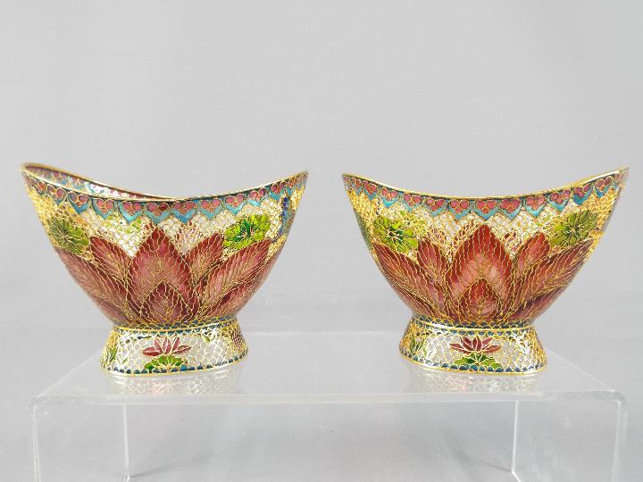 A pair of modern plique-a-jour bowls depicting stylised flowers and butterflies,