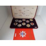 London Fire Brigade Historic Badges - a cased set of ten badges issued in a limited edition with