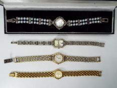 Four wrist watches to include Citizen 9016120, Rotary LB0712,