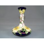Moorcroft - A Moorcroft Pottery vase in the 'Golden Shrine' pattern,