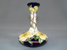 Moorcroft - A Moorcroft Pottery vase in the 'Golden Shrine' pattern,