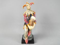 Royal Doulton - A Royal Doulton figurine 'The Jester' HN1702,