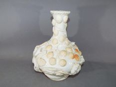 A rare and unusual Chinese dehua porcelain (Blanc de Chine) bottle vase with applied pine tree and