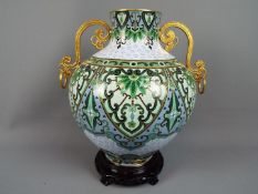 A large twin handled cloisonné vase of globular form, second half 20th century,