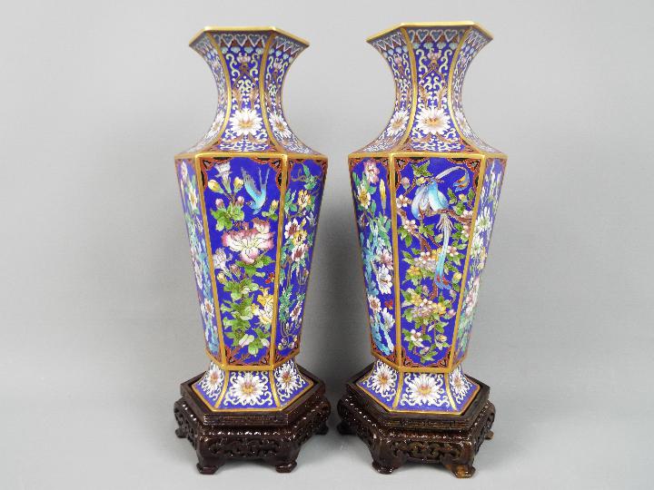A large pair of Chinese hexagonal section cloisonné vases,