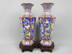 A large pair of Chinese hexagonal section cloisonné vases,