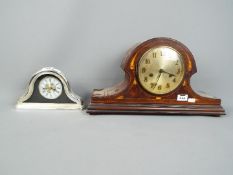 A mantel clock with inlaid decoration,