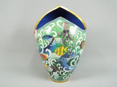 An interesting Chinese cloisonné vase of unusual form depicting various sea creatures set amongst