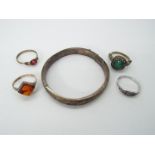 A small collection of jewellery to include silver hallmarked bangle, stone set ring stamped .