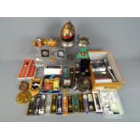 A mixed lot of collectables to include pewter, collector spoons, table lighters,