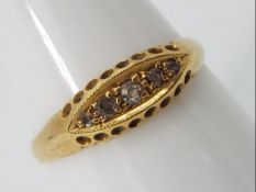 18 ct gold - a hallmarked 18ct gold ring set with 5 graduated stones, size P, approx 2.