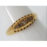 18 ct gold - a hallmarked 18ct gold ring set with 5 graduated stones, size P, approx 2.