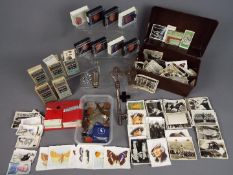 A mixed lot to include cigarette cards, Acme 'Siren', small quantity of coins,