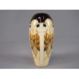 Moorcroft - A Moorcroft Pottery vase decorated in th 'Tengu Owls' pattern,