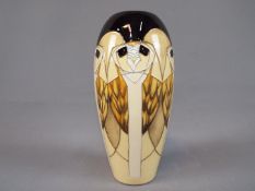 Moorcroft - A Moorcroft Pottery vase decorated in th 'Tengu Owls' pattern,