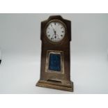 A small silver cased Art Nouveau style desk clock or watch,