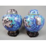 A pair of Chinese cloisonné ginger jars and covers with floral decoration,