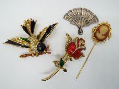 Costume jewellery to include a Sphinx enamel bird brooch # 9924, enamelled flower brooch,