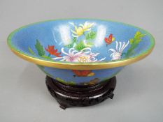 A Chinese cloisonné enamel bowl decorated to the interior and exterior with chrysanthemum and