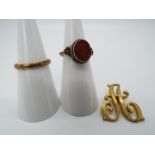 Goldstone - a white metal ring set with flat oval Goldstone, measuring 1 cm x 0.