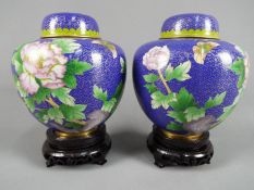 A pair of Chinese cloisonné enamel ginger jars with covers,