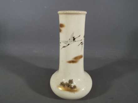 A Meiji period Satsuma vase of unusual bottle form having a broad neck above a compressed lower