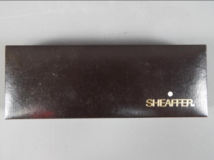 A boxed Sheaffer fountain pen with 14ct gold nib. - Image 3 of 3