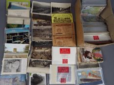 Deltiology - a collection in excess of 300 postcards and ephemera to includev road maps of Wales