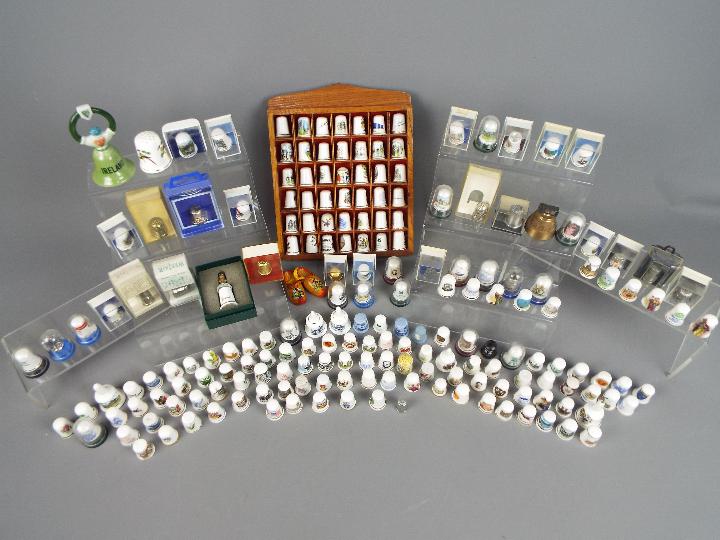 A collection of various thimbles and similar.