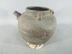 A Chinese terracotta storage vessel (possibly Song dynasty) with three loop rings to the shoulder