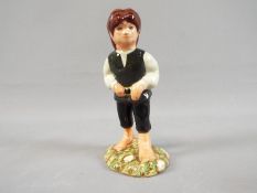 Royal Doulton - A Royal Doulton Tolkien Middle Earth 'Lord of the Rings' figurine, 'Frodo',