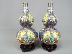 A pair of Chinese cloisonné double gourd vases,