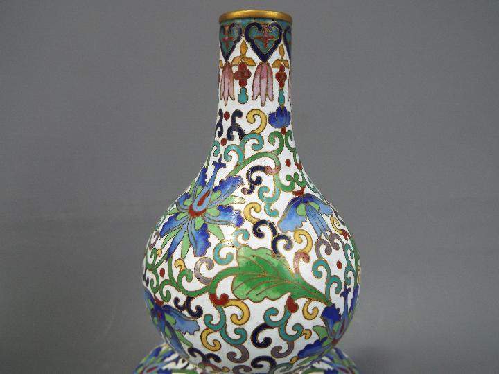 A pair of Chinese double gourd cloisonné vases decorated throughout with stylised lotus scrolls - Image 4 of 4