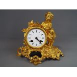 A good, floral and rococo-styled ormolu French mantel clock,