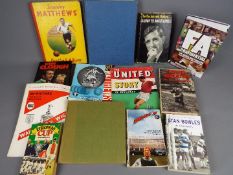 A collection of sporting related books,