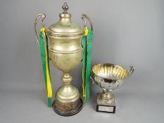 Two vintage, white metal, amateur rugby league trophies, The Noel Tatlock Trophy and the N.W.C.A.R.